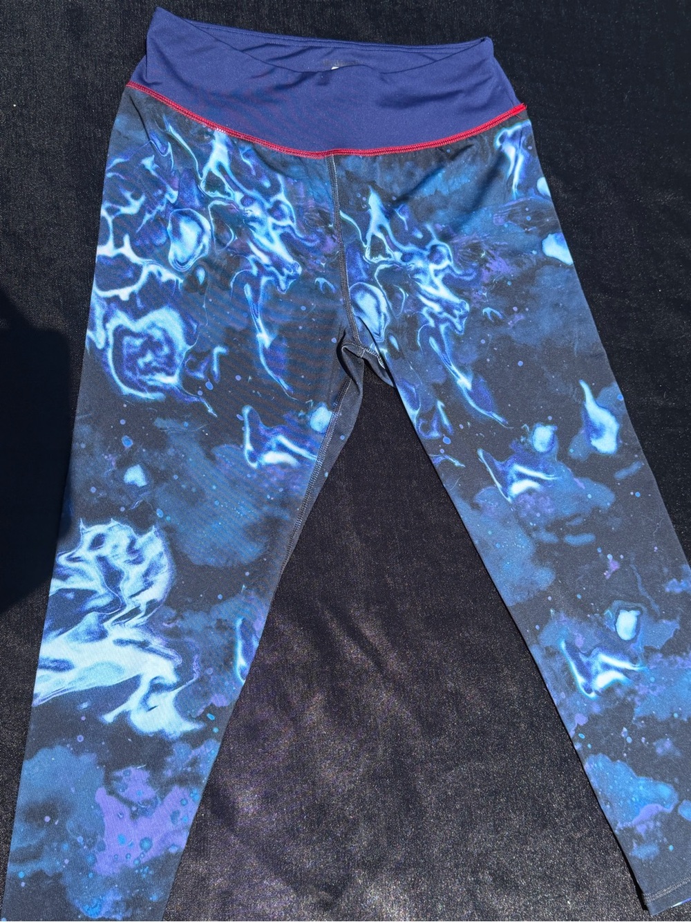 Superman galaxy print capri leggings by Her Universe